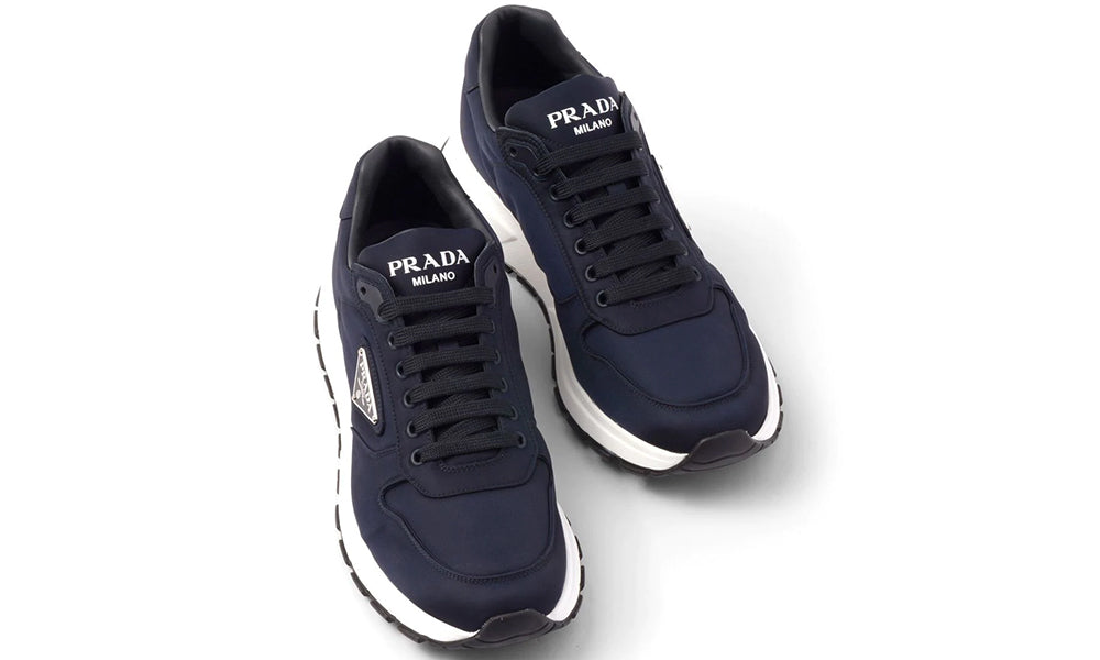 Prada logo-print low-top sneakers - ARABIA LUXURY