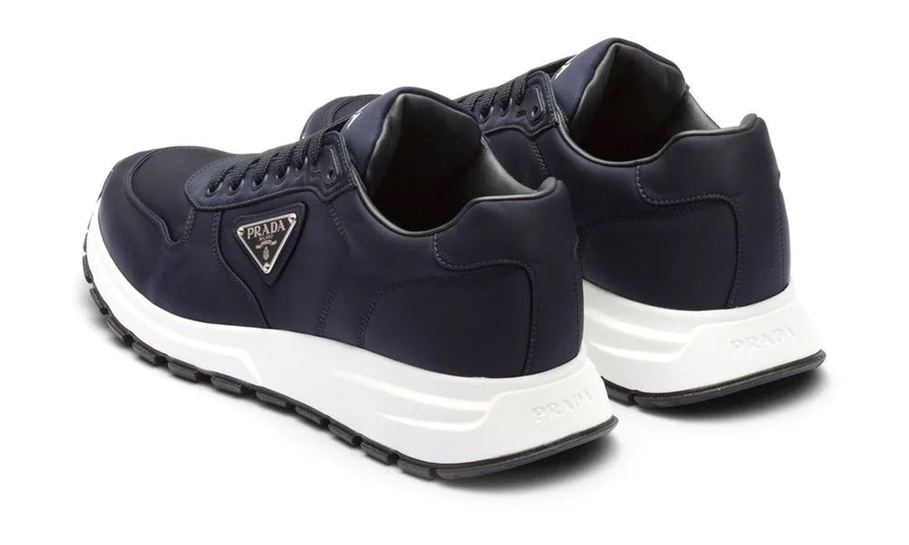 Prada logo-print low-top sneakers - ARABIA LUXURY