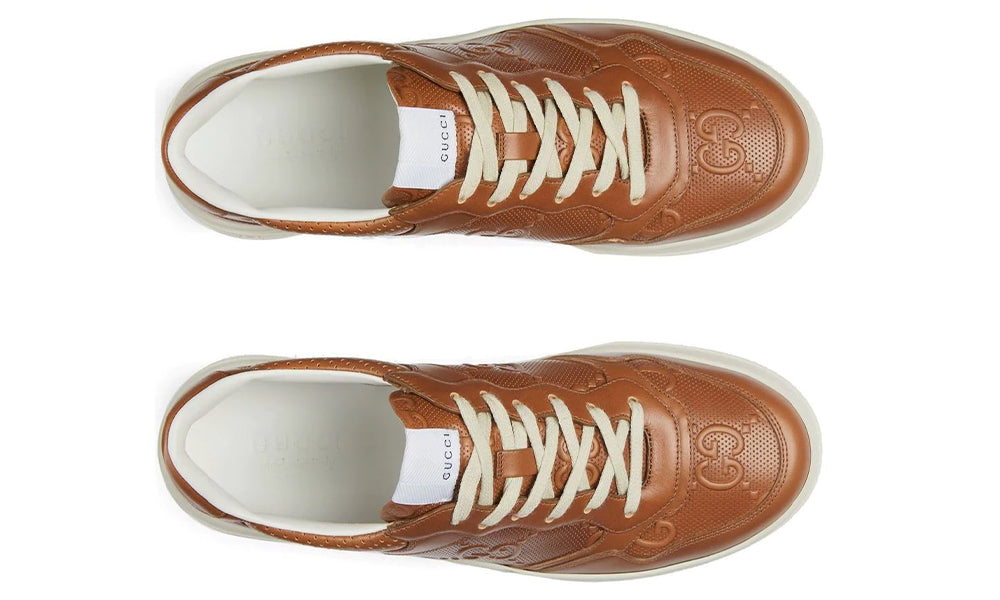 GUCCI  logo-embossed sneakers - ARABIA LUXURY